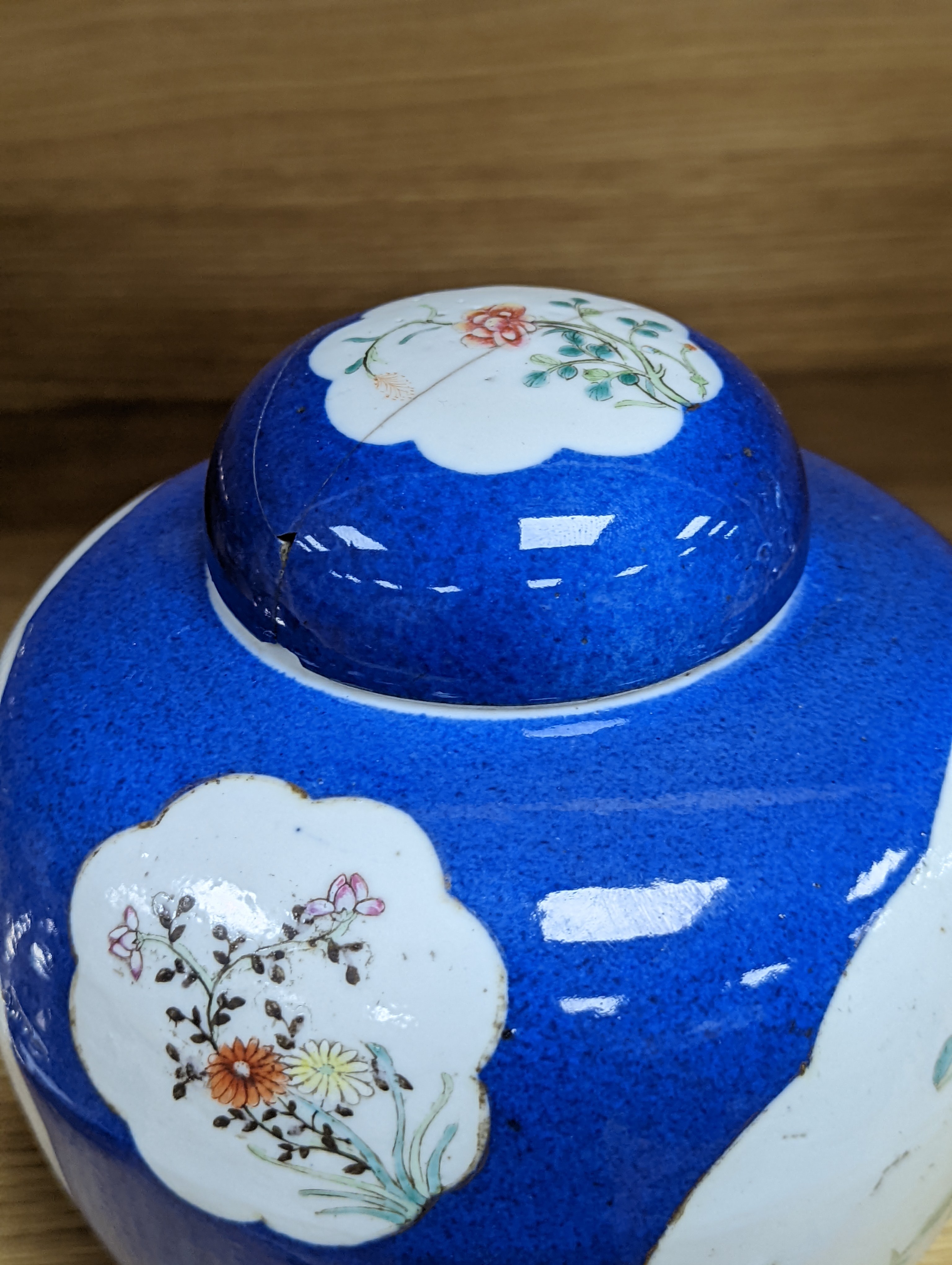 A Chinese blue ground jar and cover, 19th century, Qianlong mark to base, 20cm high